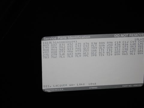1991 Ford LTD Crown Victoria - GM Service Parts Identification label showing factory RPO build option codes and paint code WA-L848.