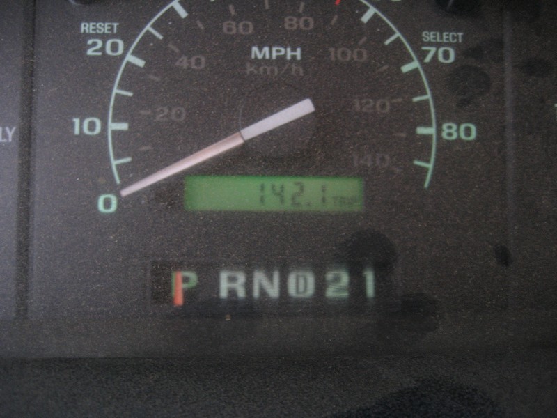 1995 Ford Bronco instrument cluster showing speedometer, odometer, and gear selection.