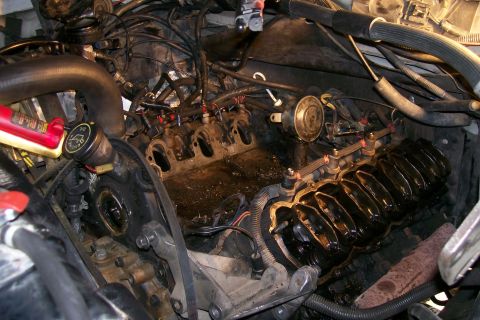 1992 Ford C-350 (Centurion Conversions) - Close-up view of an engine's internal components after cylinder head removal.