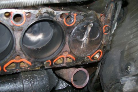 1992 Ford C-350 (Centurion Conversions) - This is a close-up view of an engine's cylinder head, showing the cylinder bores and valves.