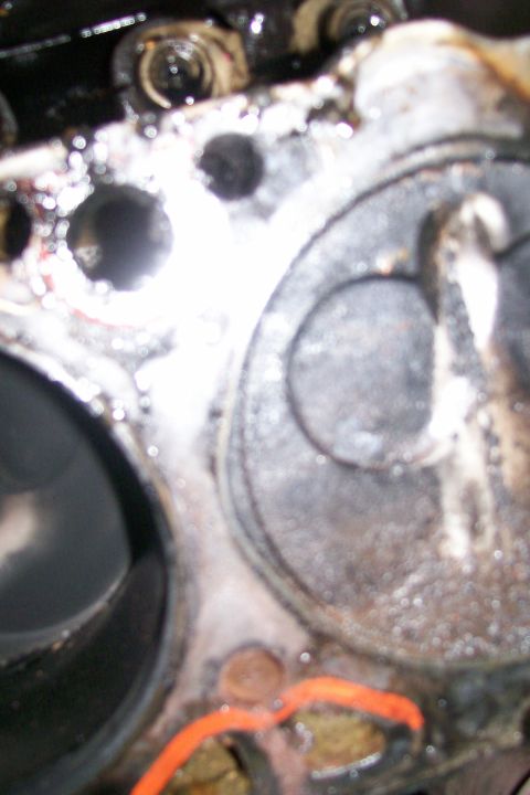 1992 Ford C-350 (Centurion Conversions) - Close-up view of an engine's cylinder head, showing valves and internal components.