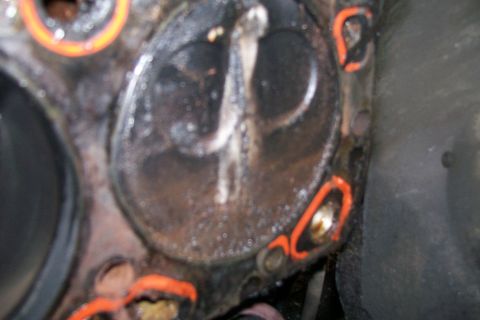 1992 Ford C-350 (Centurion Conversions) - Engine cylinder head detail with valves visible, likely from a repair or rebuild.