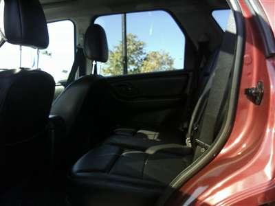 2006 Ford Escape - View of the rear passenger area and side door of a vehicle.