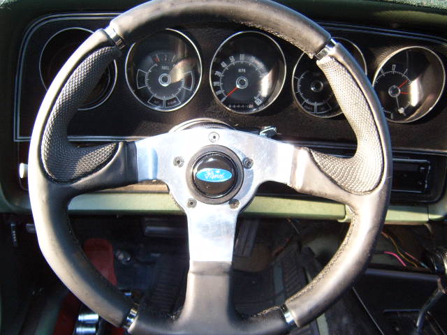 Vintage Ford steering wheel and dashboard gauges