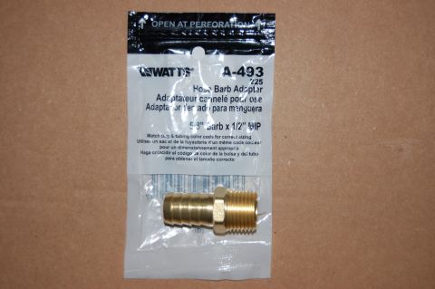 1989 Ford Bronco - A package containing a brass hose barb adapter is shown against a brown background. The packaging indicates it is a Watts A-493 5/8" Barb x…