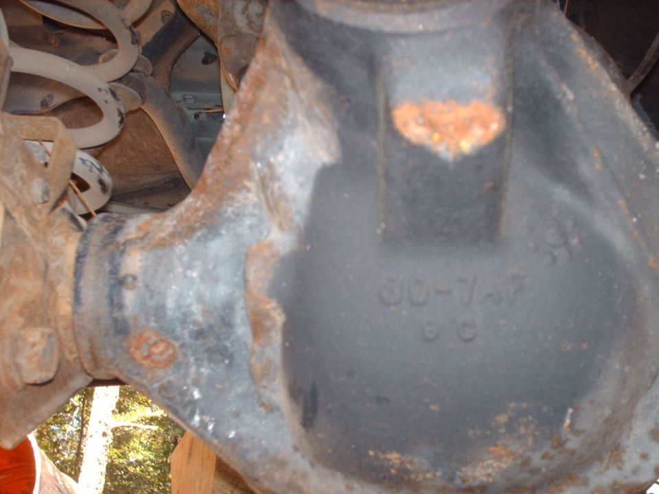 Rear axle differential housing with casting numbers '60-7A2' and 'CC'