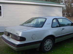 2004 Ford F-150 - Rear view of a silver 1987 Ford Thunderbird coupe.