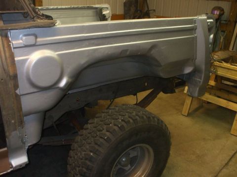 1995 Ford Bronco - first coat of rust bullet on drivers side tub