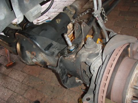 1996 Ford Bronco - The chain was used, with a come-a-long, to help align the radius arm bolt hole. worked for the top bolt, but not the bottom...bye bye brack…