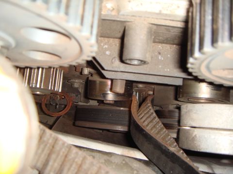 1998 Volvo V70 - The timing belt tensioner failed, feeding the intact belt out the cover