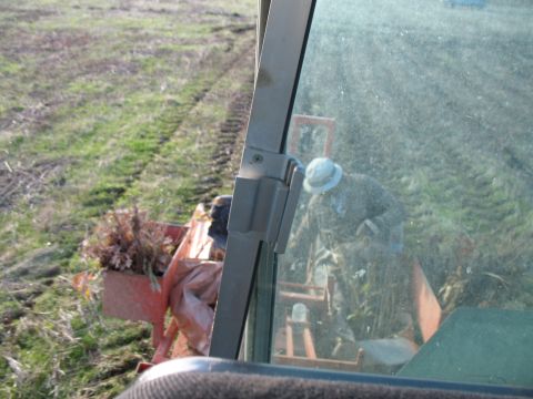 1993 Ford Bronco - blurry, crappy pic of the planter rider puttin em in the ground