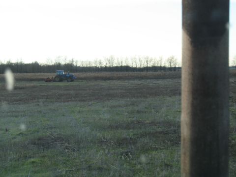 1993 Ford Bronco - the other planter running. That weird, rusty tree looking thing is the exhaust pipe on the tractor I'm running.