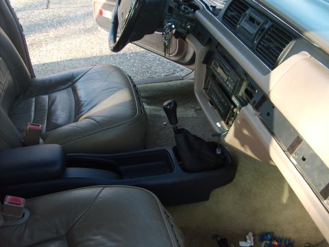 1993 Ford Crown Victoria - Interior view of a 1993 Ford Crown Victoria, highlighting the leather seats and center console.