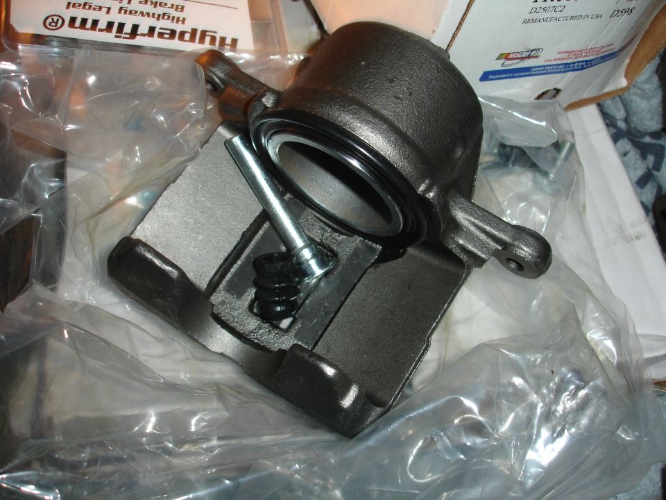 Remanufactured brake caliper in packaging with box and label
