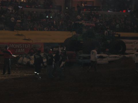 1994 Ford Bronco - Monster truck event with crowd and banner visible.