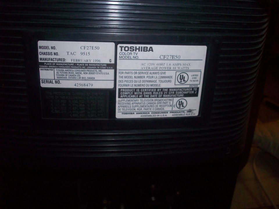 Toshiba color TV model CF27E50 rear label with chassis TAC 9515 and February 1996 manufacture date