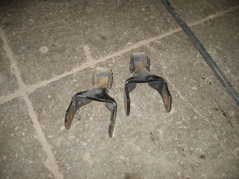1995 Ford C-350 (Centurion Conversions) - These are leaf spring shackles, likely for a truck or heavy-duty vehicle.