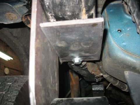 1995 Ford C-350 (Centurion Conversions) - Custom suspension bracket modification shown on a vehicle's frame.