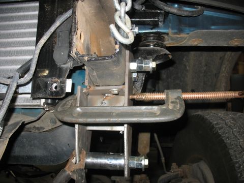 1995 Ford C-350 (Centurion Conversions) - Vehicle frame modification in progress, showing a C-clamp securing metal components. A tire is visible.