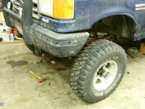 1988 Ford Bronco - Front view of a 1988 Ford Bronco with a bull bar and large off-road tires.