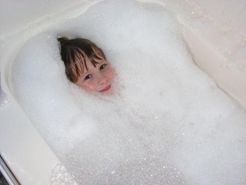 1991 Ford Bronco - A child enjoys a bubbly bath.