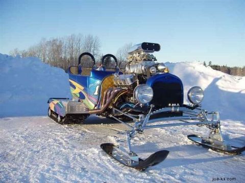 1989 Ford F-150 - Custom snowmobile with a blown V8 engine and dual seats sits in a snowy landscape.