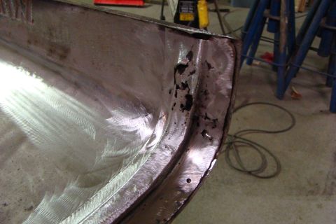 1948 Jeep Wrangler - Metal panel shows significant rust and damage, indicating it's a repair or replacement part.
