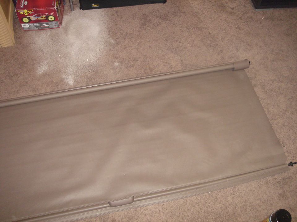 Tan cargo cover with handle