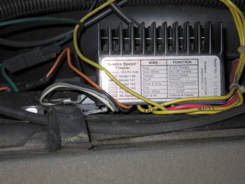 1991 Ford LTD Crown Victoria - Photo of an installed flasher module showing its wire-function label, a physical part rather than a document.