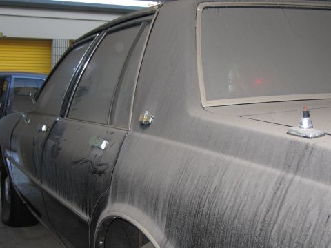 1991 Ford LTD Crown Victoria - Exterior photo of a sedan's side, not a document.