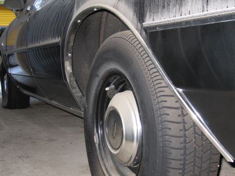 1991 Ford LTD Crown Victoria - Photo of a vehicle wheel and fender, not a document.