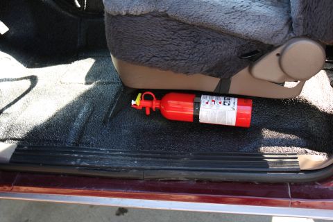 1996 Ford Bronco - another view of the fire extinguisher and herculiner in the front