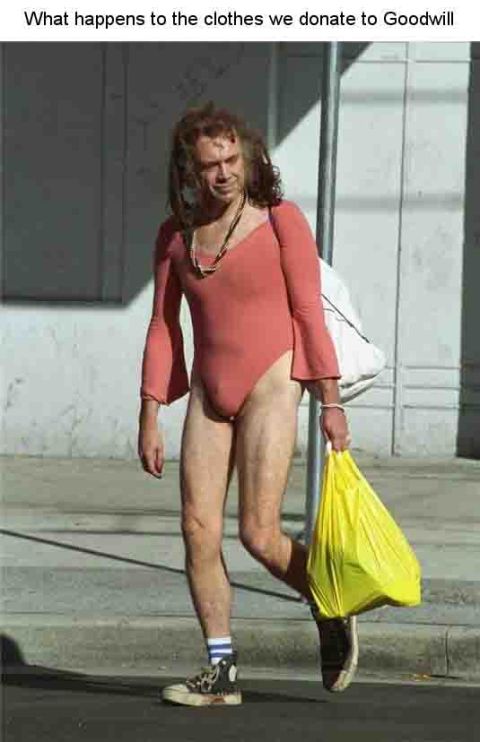 1990 Ford Bronco - A person walks down the street wearing a leotard and carrying shopping bags.