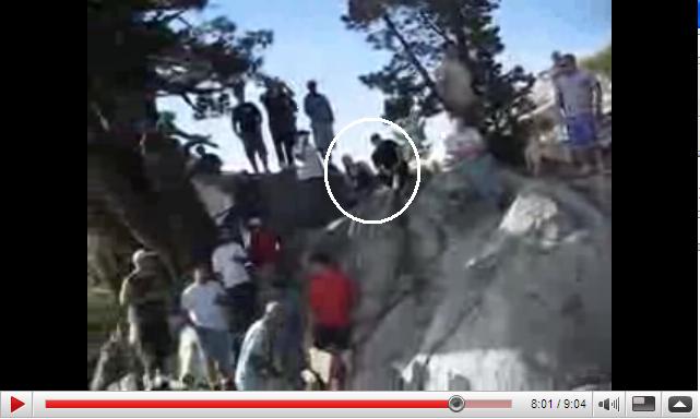 People jumping off a cliff.