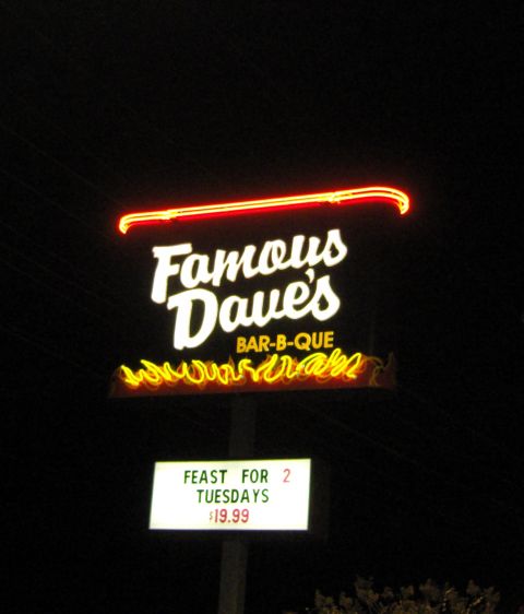 2007 Ford Mustang - Photograph of an illuminated restaurant sign at night, not a technical document.