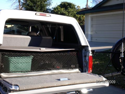 1996 Ford Bronco - The covers are nice for keeping gear out of the sun or hidden from prying eyes. The net is stock too but pretty much useless other than hol…