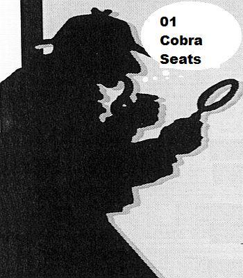 1998 Ford Taurus - A silhouette of Sherlock Holmes appears to be investigating the concept of 'Cobra Seats' with his magnifying glass.