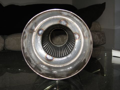 1991 Mitsubishi 3000GT - This is a close-up view of a custom exhaust tip, showing the internal mesh and welding details.