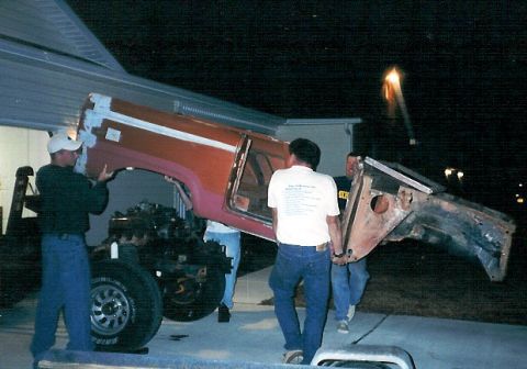 1975 Ford Bronco - With some help from the neighbors, we got the body off the frame. I'm wearing the white shirt; Frank has the other A-pillar. We gave the yo…