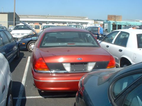 1999 Ford Crown Victoria - Another shot of the red PI. Had 118K miles at the time.