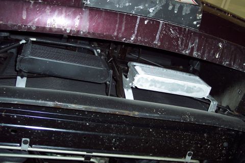 2001 Ford Crown Victoria - Two oil coolers are visible in front of the radiator assembly.