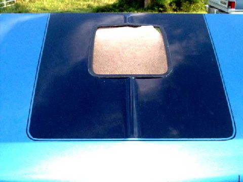 1984 Ford Bronco - shaker hood, top view, Ford medium blue metallic, center is Ford indigo blue metallic, both are urethane-based. Trim ring is also glued aro…