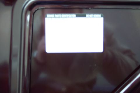 2001 Ford Crown Victoria - A digital display screen shows service parts identification information.
