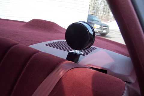 2001 Ford Crown Victoria - View from the back seat shows a speaker and another vehicle outside.