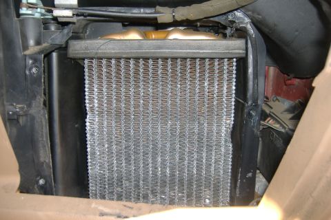 1989 Ford Bronco - Cover off and there is the core. See the black thing on top of the core? That's a pad - keep it as it needs to go on the new core. God, the…