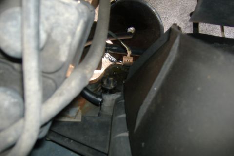1989 Ford Bronco - Open the hood, we have to drain the coolant first. What you're looking at here is a top down view of the left side of the radiator. See the…