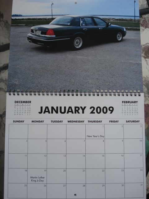 2000 Ford Crown Victoria - A black sedan is pictured on a calendar page for January 2009.