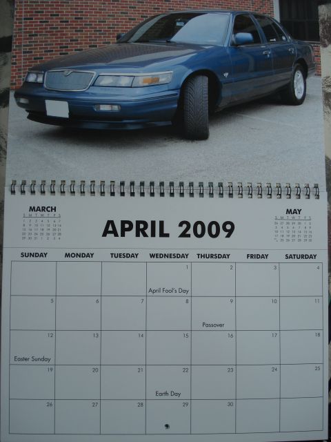 2000 Ford Crown Victoria - A blue sedan is pictured on a calendar page for April 2009.
