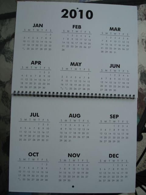 2000 Ford Crown Victoria - A wall calendar displays the months of 2010.
