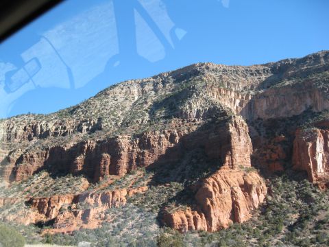 1993 Ford Bronco - A scenic view of a mountainous region, likely captured from within a vehicle, with the "Supermotors.net" watermark visible.
